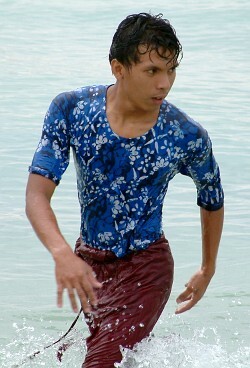 Swimming in clothes.
